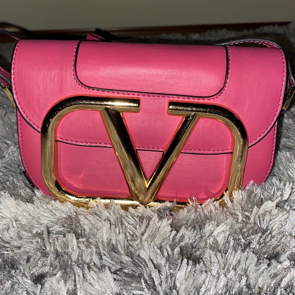 Pink and gold Valentino crossbody bag.